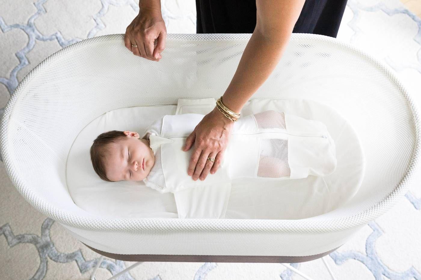 Baby safely sleeping in SNOO