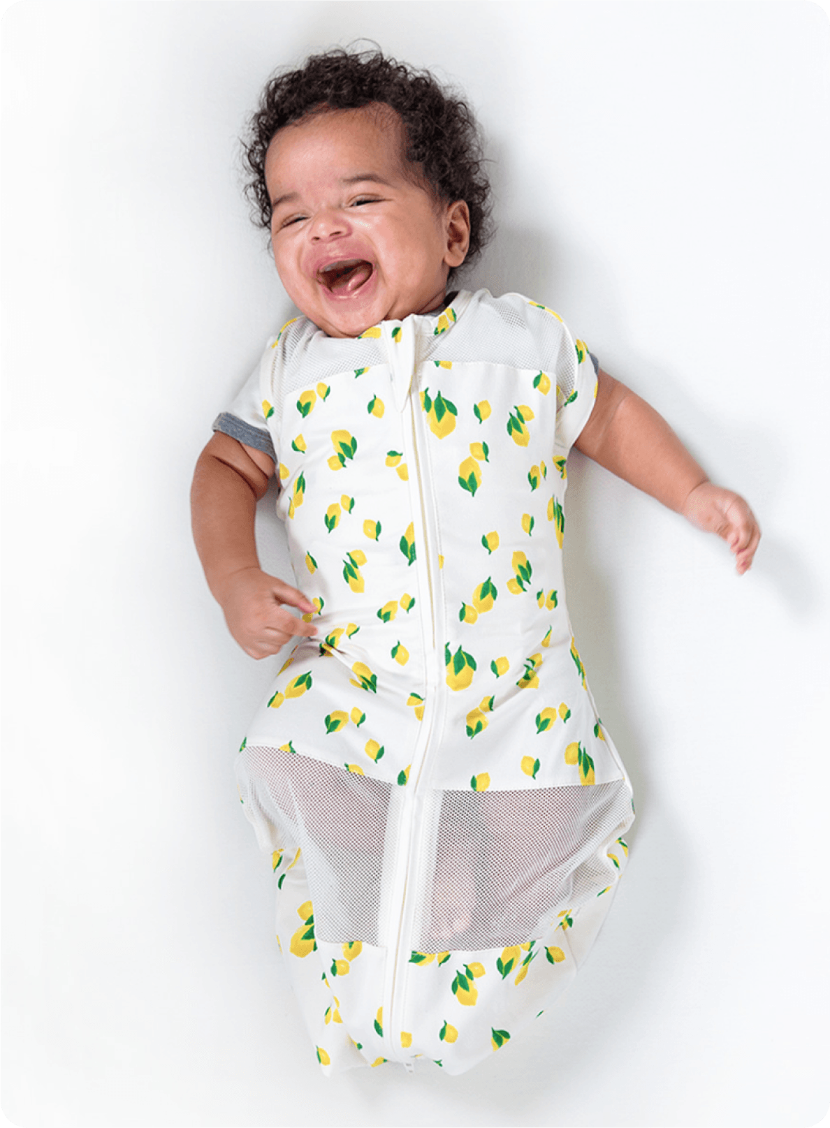 Bebis i sovpåse med armarna ut