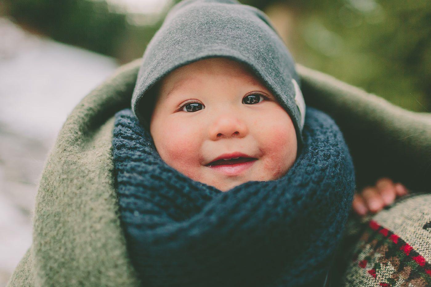 Winter baby names: cute bundled up baby